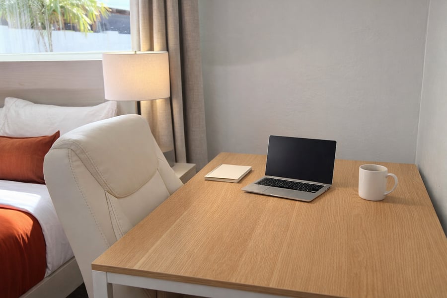 Dedicated workspace with strong Wi-Fi and ample power outlets ideal for remote professionals and extended stays