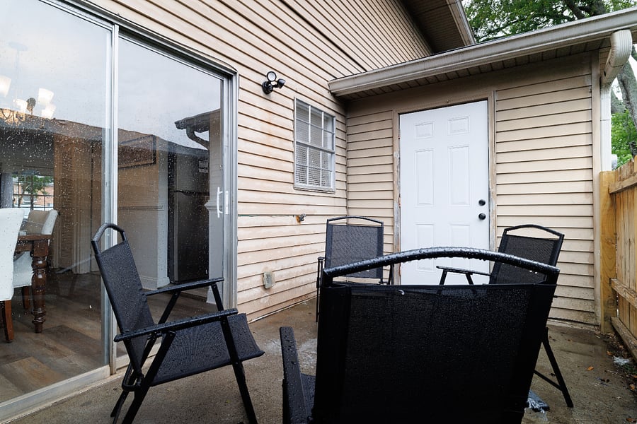 private patio with table and 4 chairs