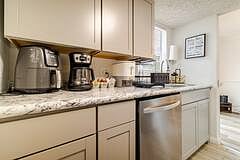 kitchen counter appliances- ninja, coffee, kettle