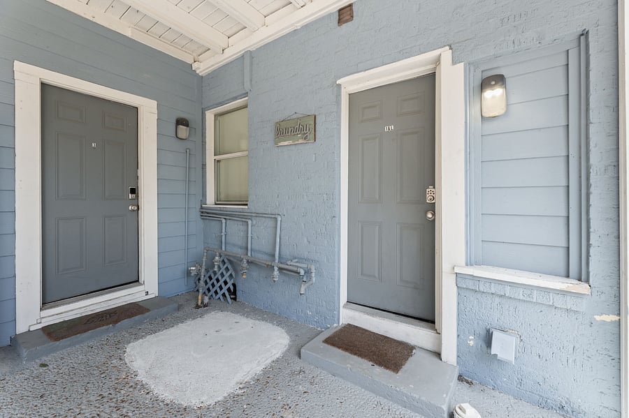 Entrance to Shared Building Laundry Room with Washer & Dryer. Be advised also the back entrance to Unit #1, but it is a locked door. 