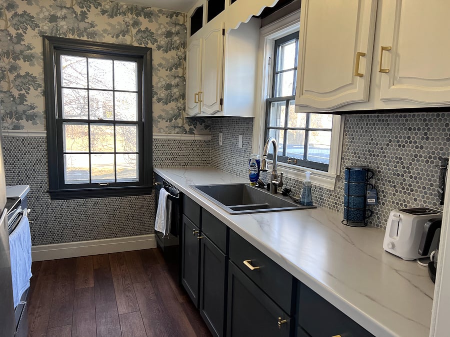 Kitchen with dishwasher, fridge, range, microwave