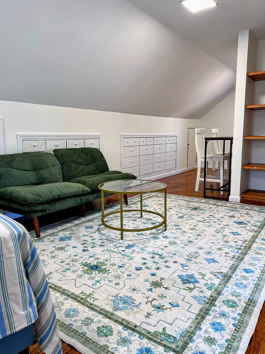 Second floor seating area with futon (1 of 2)