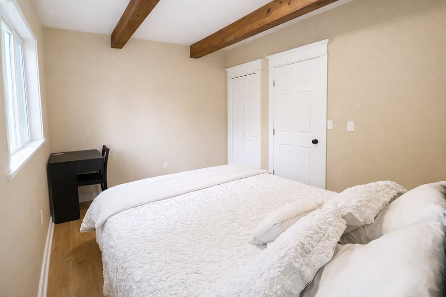 Bright natural light by day, blackout curtains for restful nights, and fresh brand-new bedding every stay.