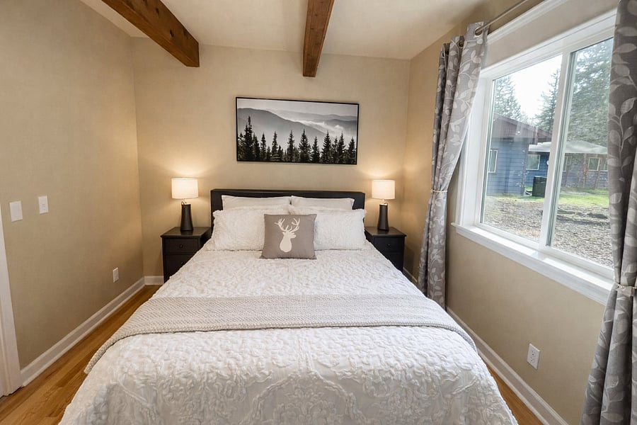 Bright natural light by day, blackout curtains for restful nights, and fresh brand-new bedding every stay.