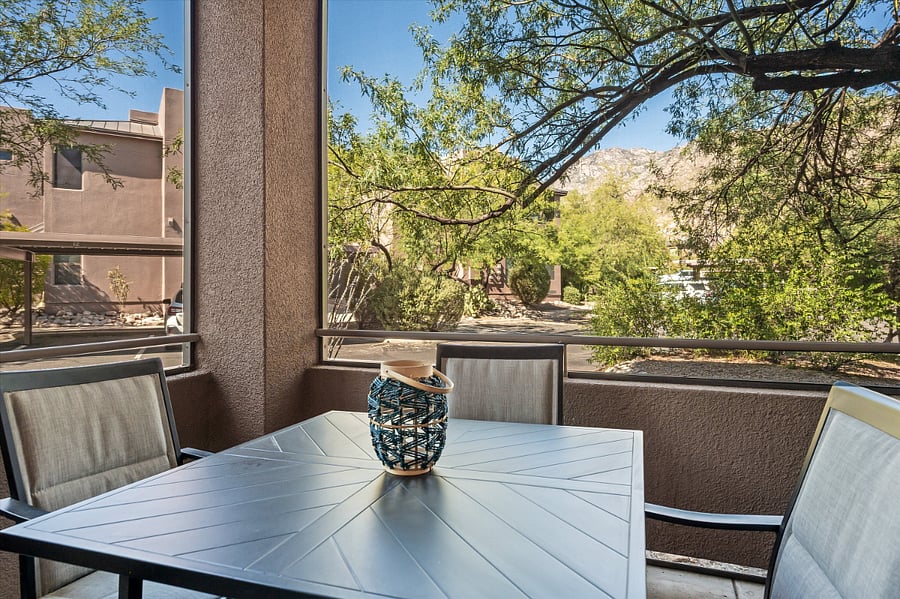 Patio with dining table and chairs. Perfect place to start and end your busy days.