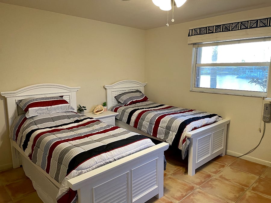 Two twin beds and third bedroom.