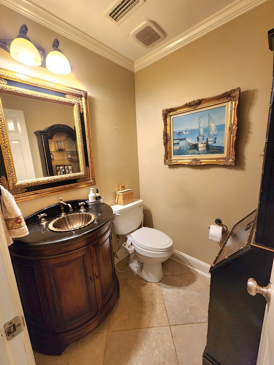 Half bath 1st Floor off laundry and kitchen