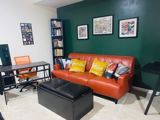 Large living room with dedicated workstation.