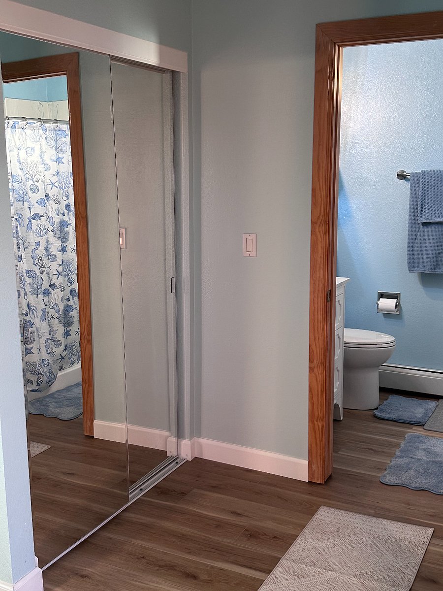 Master bedroom; 1st closet & entry to private, full bathroom