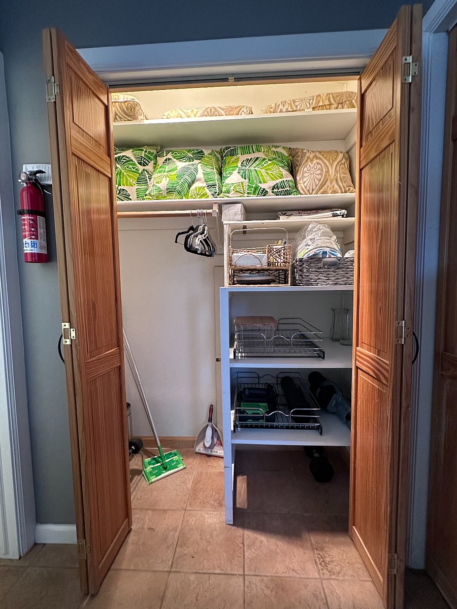 Main level storage closet with picnic ware