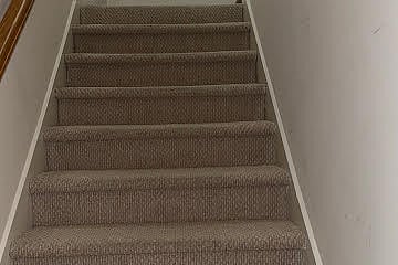 Private stairs to bedroom suite