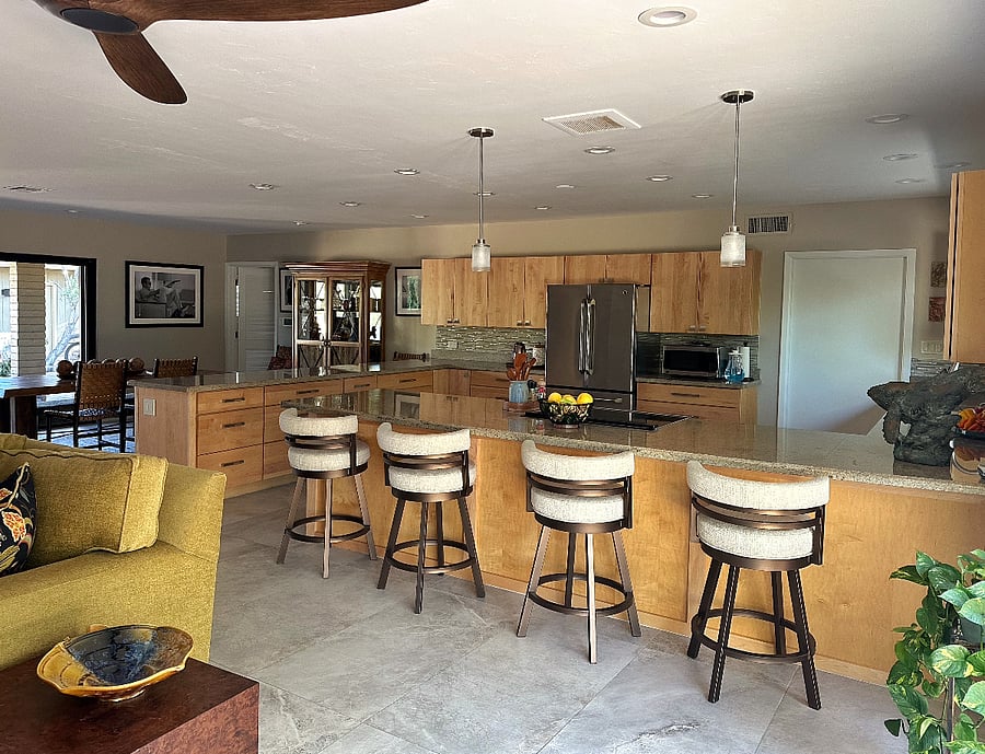 Open great room with view of kitchen