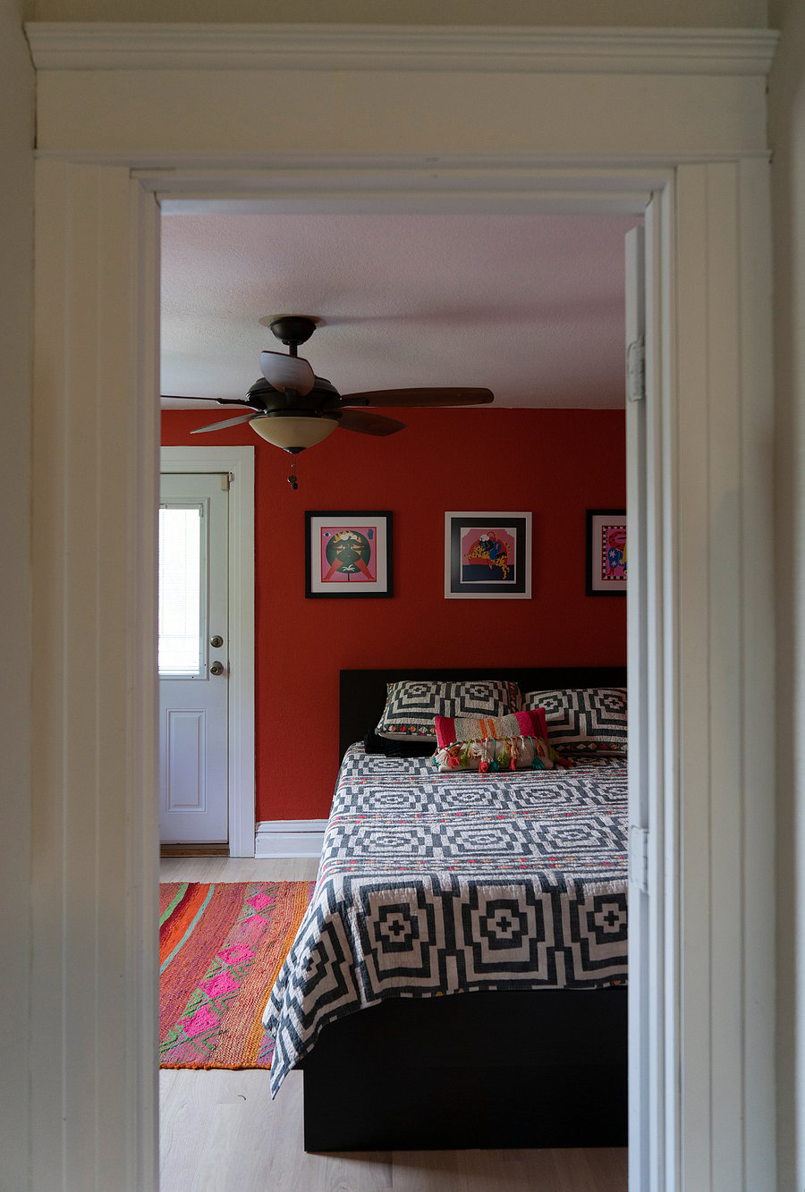Bedroom #2 with standing desk and private balcony.