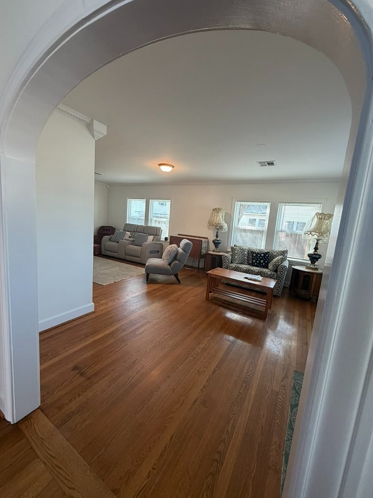 view of living room and front entrance from dining area