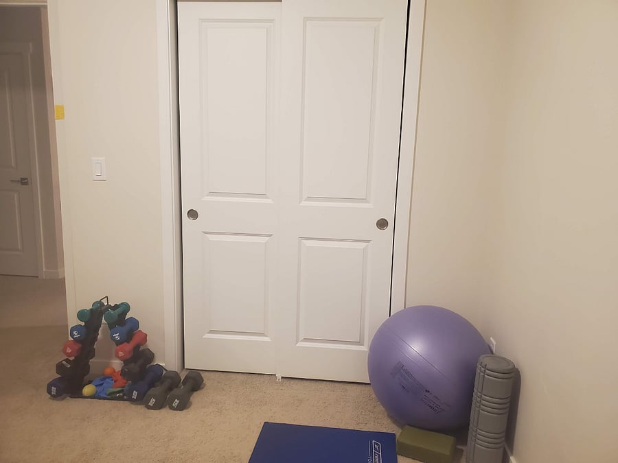 The office also contains 3 to 15lb dumbbells, yoga mat and block, foam roller, etc.