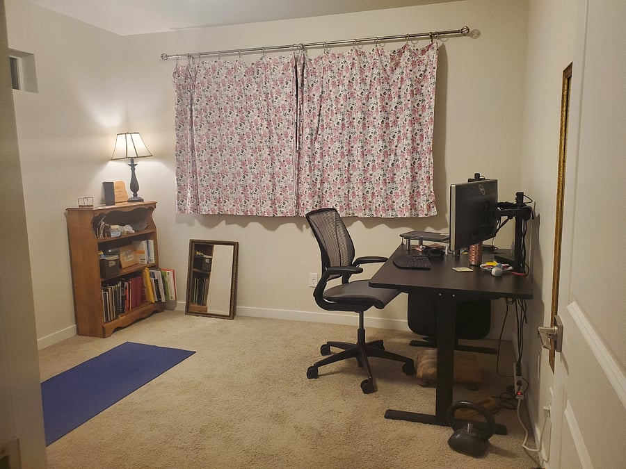 Office with docking station, electric sit/stand desk and two monitors.
A 4-inch, deluxe camping mat is available to turn this into a basic bedroom.