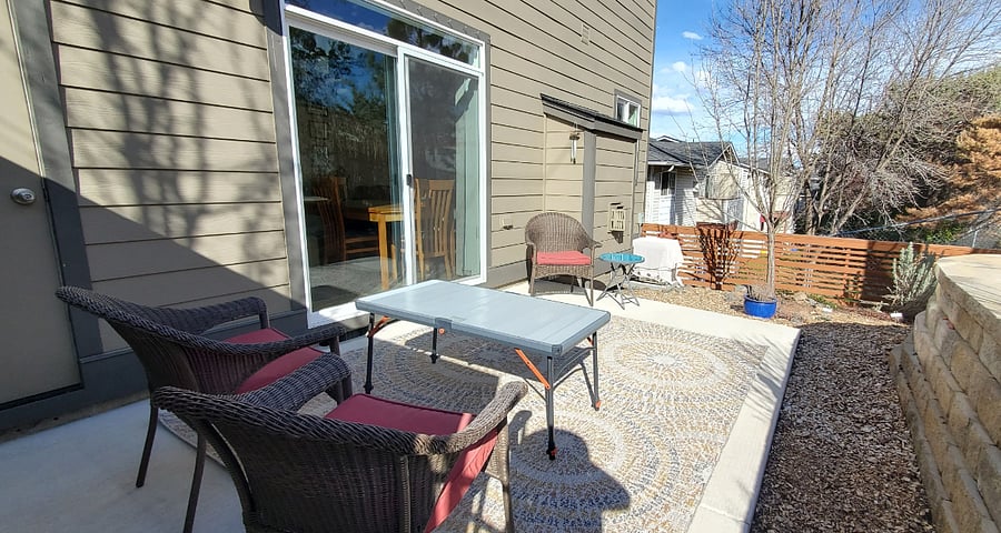 Small, fenced outdoor space is not dog proof.