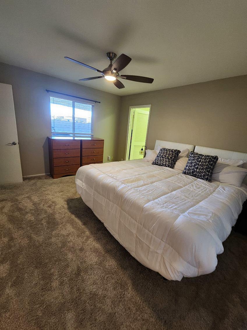 Main bedroom with split king. Each side of bed head and foot are remote control adjustable. Large walk-in closet.