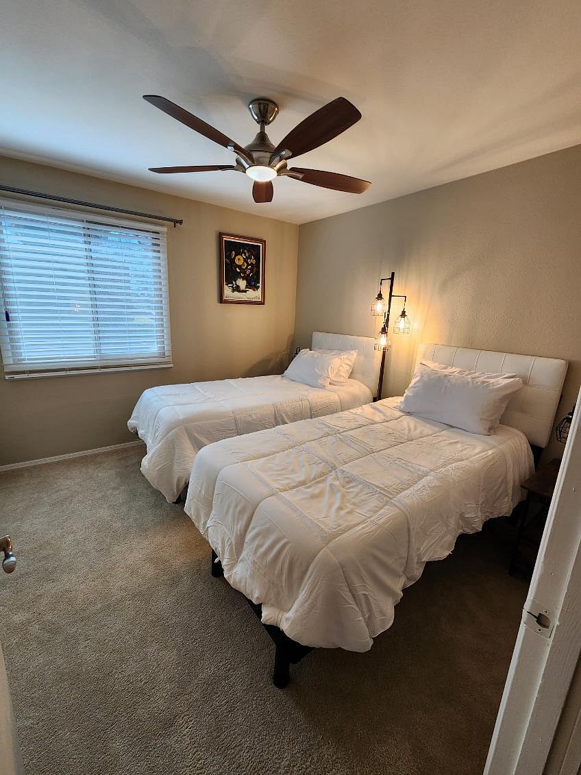 Middle bedroom with two twin adjustable beds. If you prefer, may be pushed together to make a full bed.