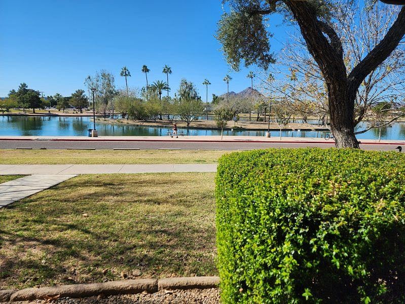 Living room picture widow facing Chaparral Park lake and exercise path.