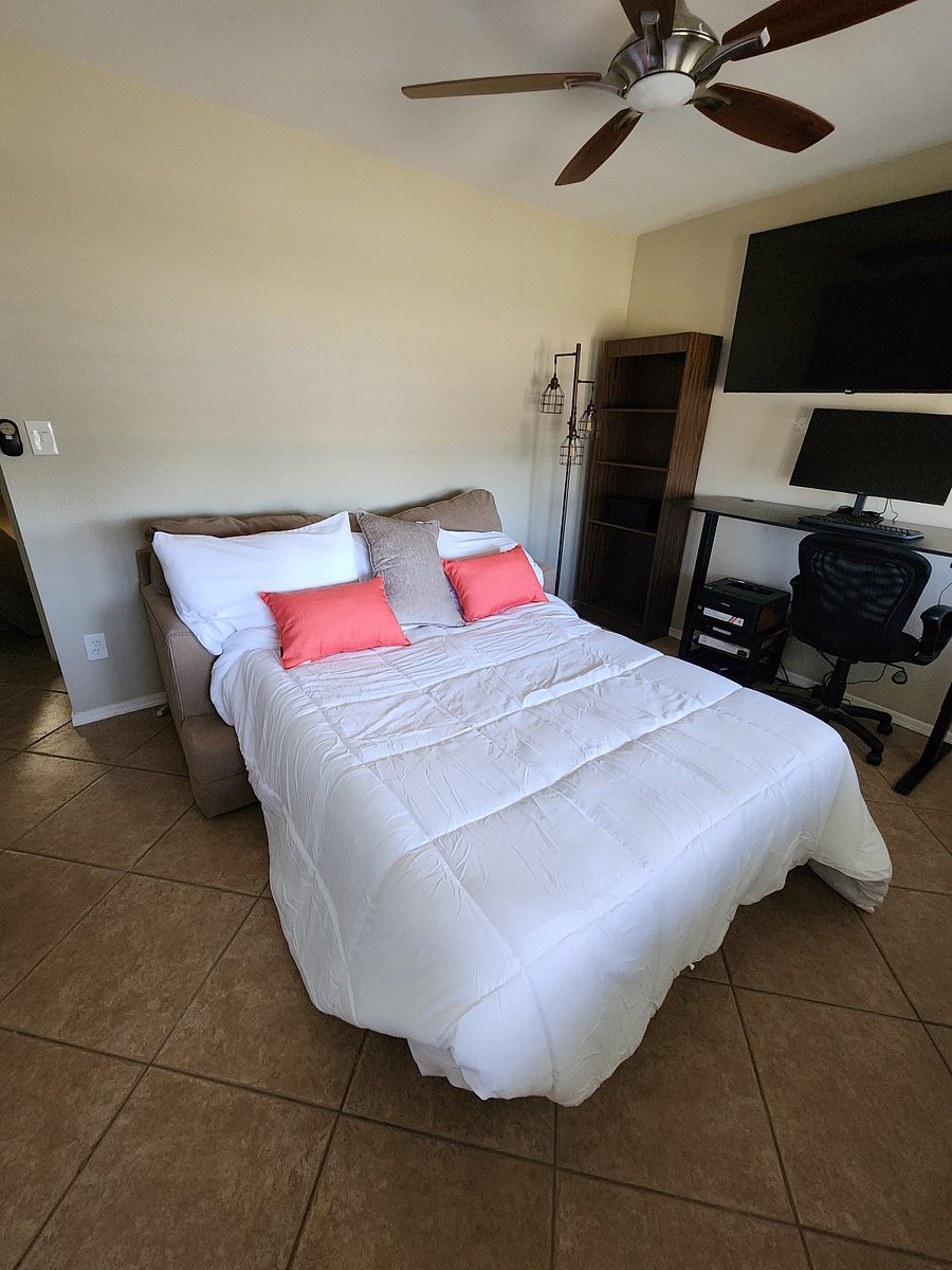 Front bedroom with sofa bed or office. Works great as both.