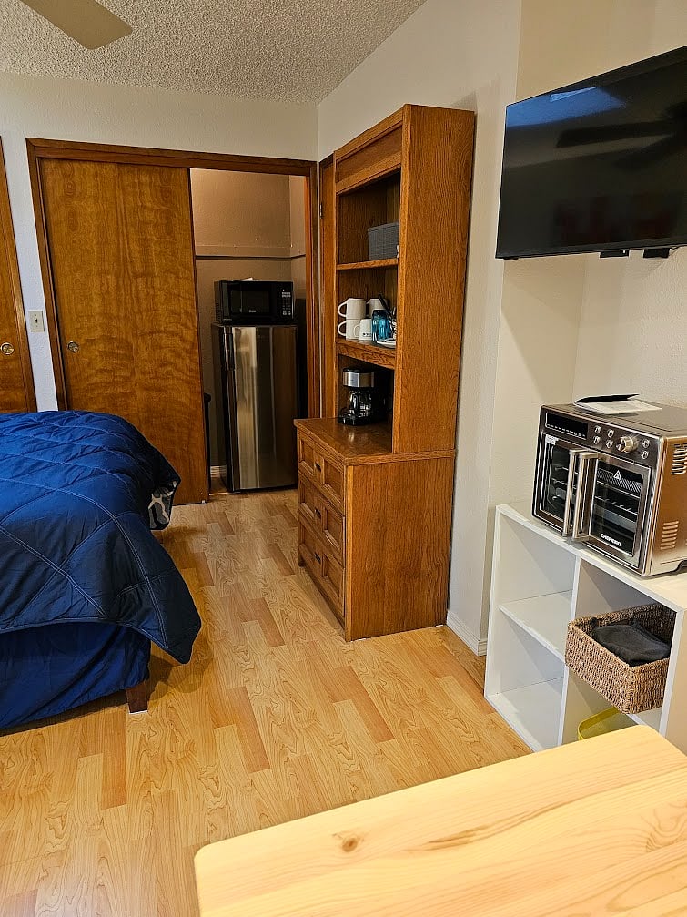 Coffee/tea bar with 3 drawers below for storage.