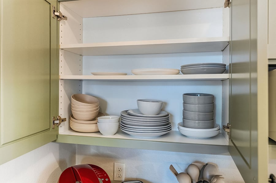 Well-stocked with both classic dishware and thoughtfully included kid-friendly options for added flexibility.