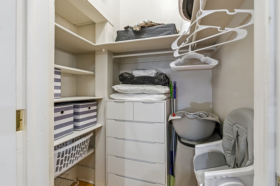 Walk-in closet with ample storage, plus convenient family-friendly items available upon request. 
