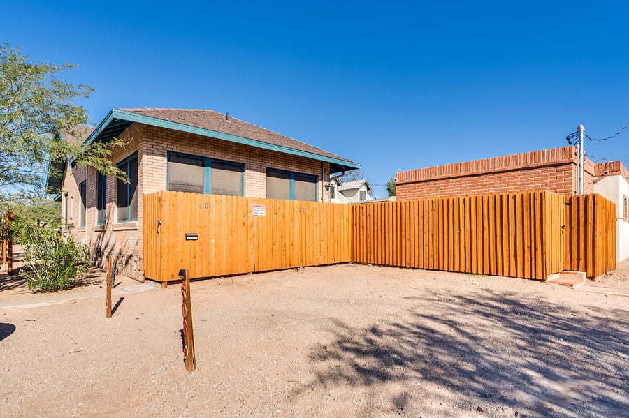 Dedicated off-street parking with a reserved space, secure gated access, and ample street parking for additional vehicles.