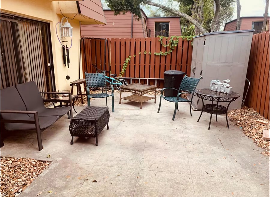 Fenced in Patio with small gas grill! Lots of beach chairs.