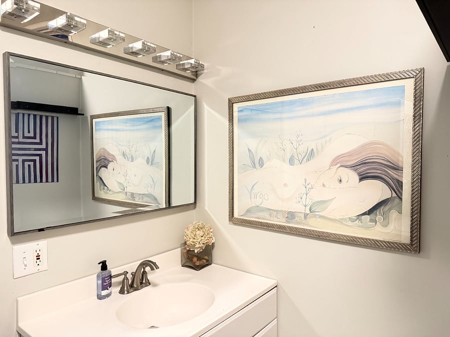 Clean and modern bathroom stocked with essential toiletries and fresh towels for your convenience.