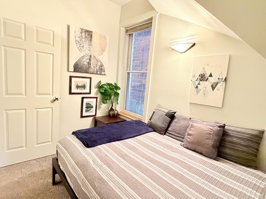 Comfortable bedroom with a double bed, soft linens, and a peaceful atmosphere for a restful nights sleep.