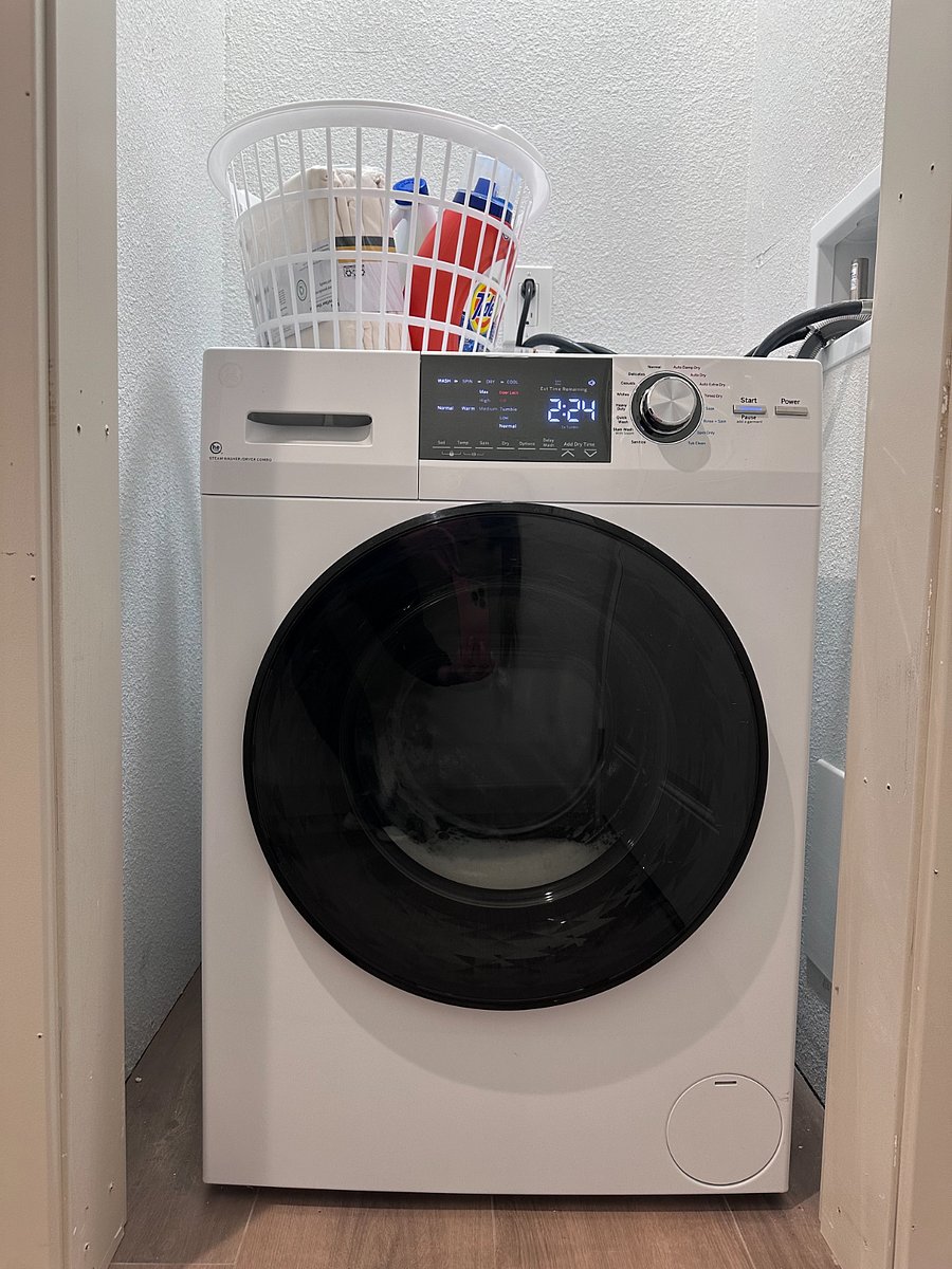 Washer/dryer combo is perfect for tossing clothes in on your way out the door, to come home to clean and DRY clothes; such a time saver.
