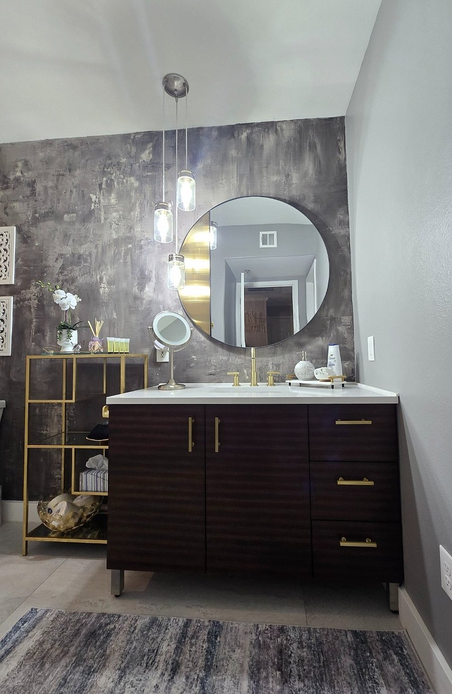 Spacious, recently renovated bathroom featuring an oversized walk-in shower and modern finishes.