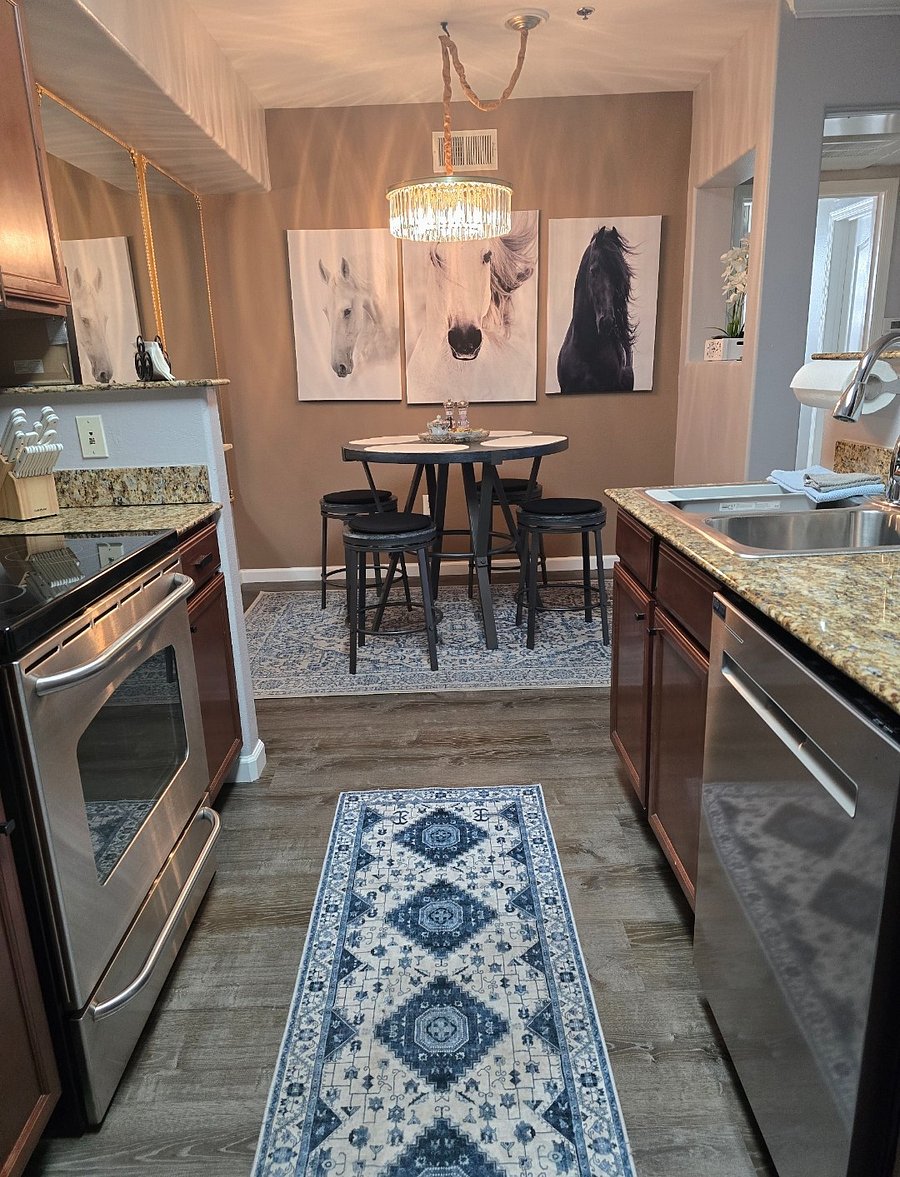 Fully equipped kitchen with cookware, dishes, utensils, and a coffee maker everything you need to feel at home.