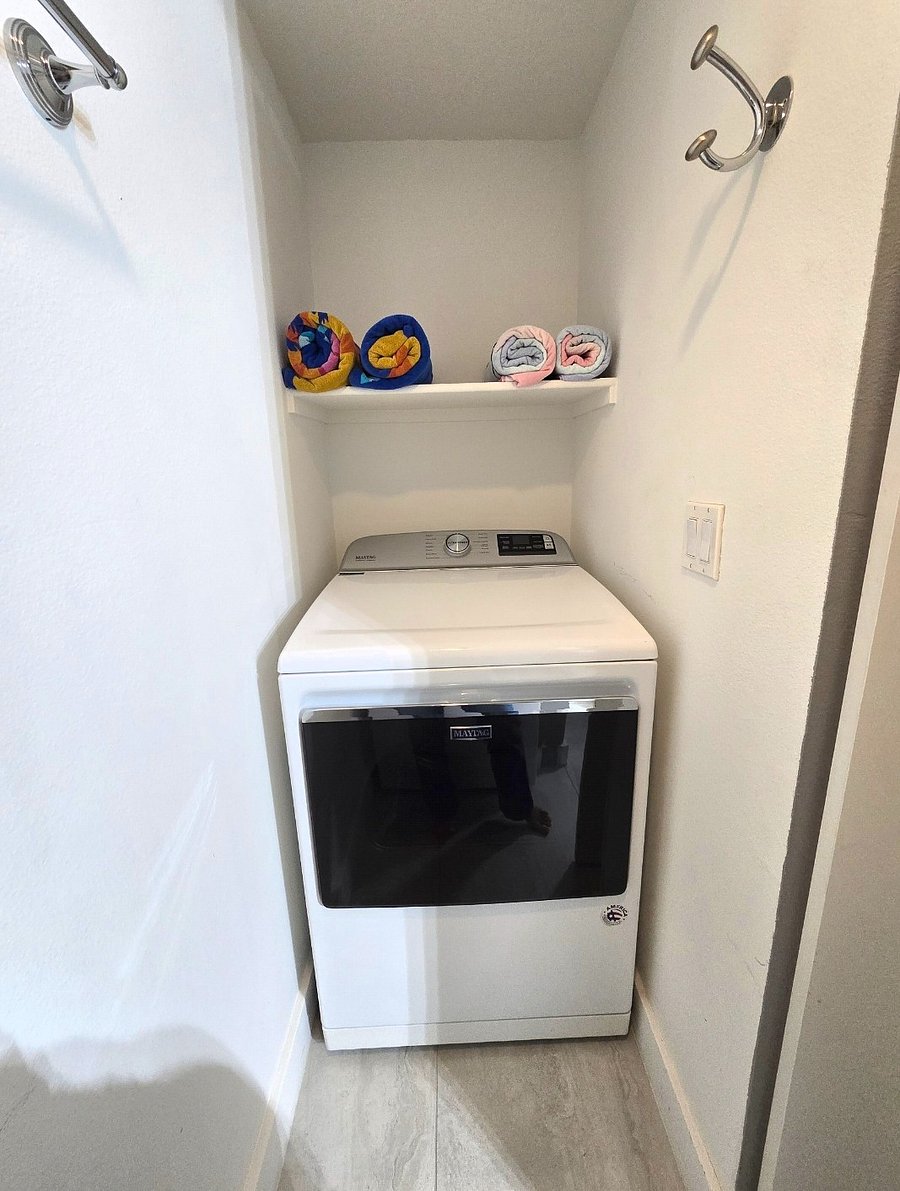 In-unit full-size washer and dryer.