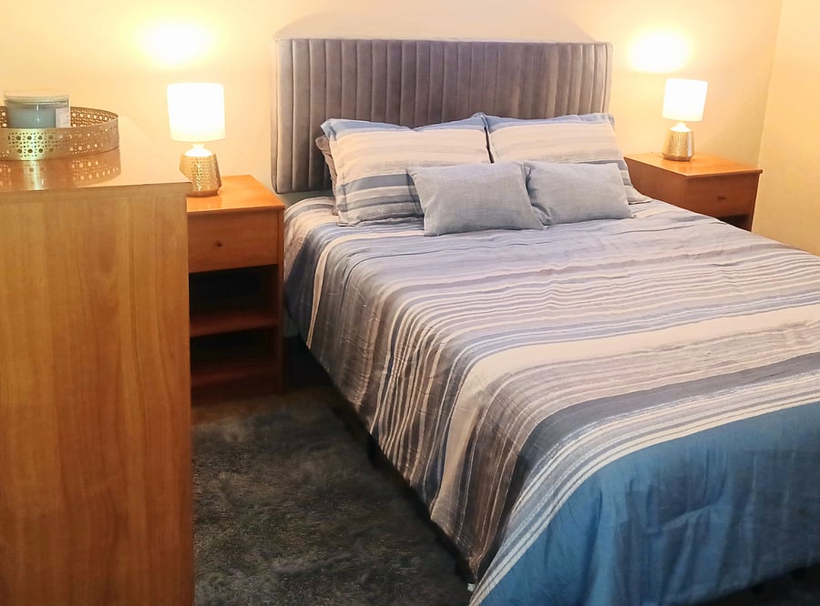 Bedroom 1 with Queen Size Memory Foam mattress, dresser, chest of drawers, two night stands, walk in closet.