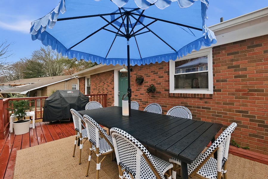 Just off the kitchen is a door leading to the large fenced yard.