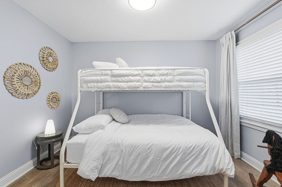 Bedroom Four is a Bunk room with a full bed on bottom and twin on top. Phone chargers, noise machine, night light, and extra blankets included