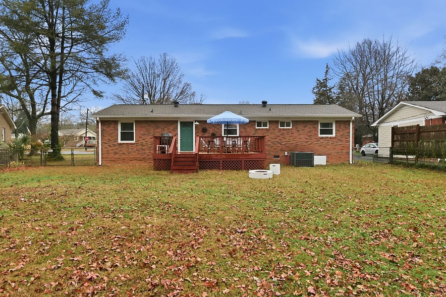 View of fenced, large backyard