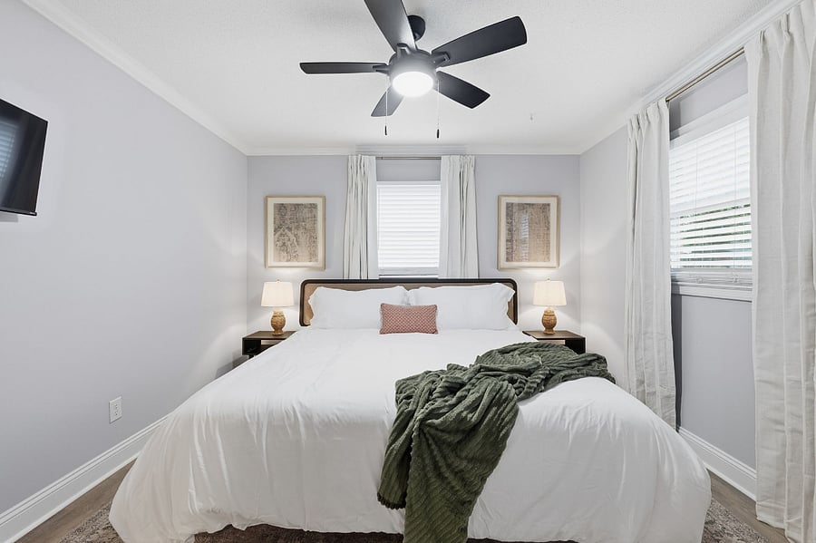 Bedroom Two includes a King Bed and a half-bath ensuite. Phone chargers, Roku TV, extra blankets. luxury mattress, and linens
