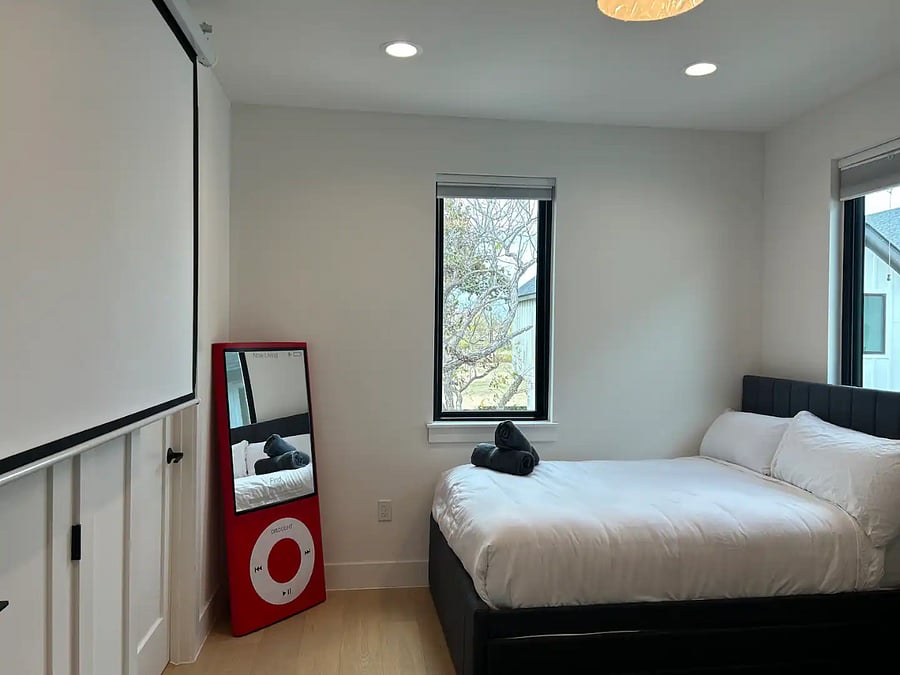 Full Bed with pull out twin size trundle Twin bed 120" remote controlled projector screen Projector with USB-C & USB connections Amazon Fire Stick Blackout blinds Extra bedding USB and USB-C Outlets Extra storage under trundle and twin bed 5' iPod Mirror