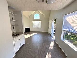 Front door to unit D. Prior to be furnishings.