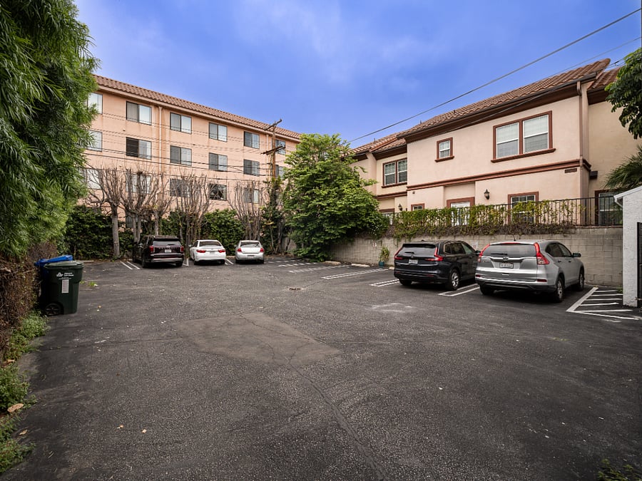 Designated private tenant parking lot in the back of the building.