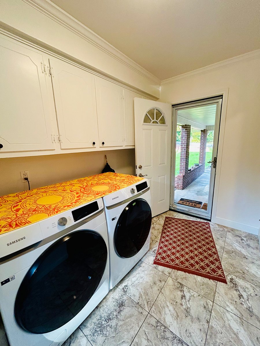 Mud Room with view of Carport