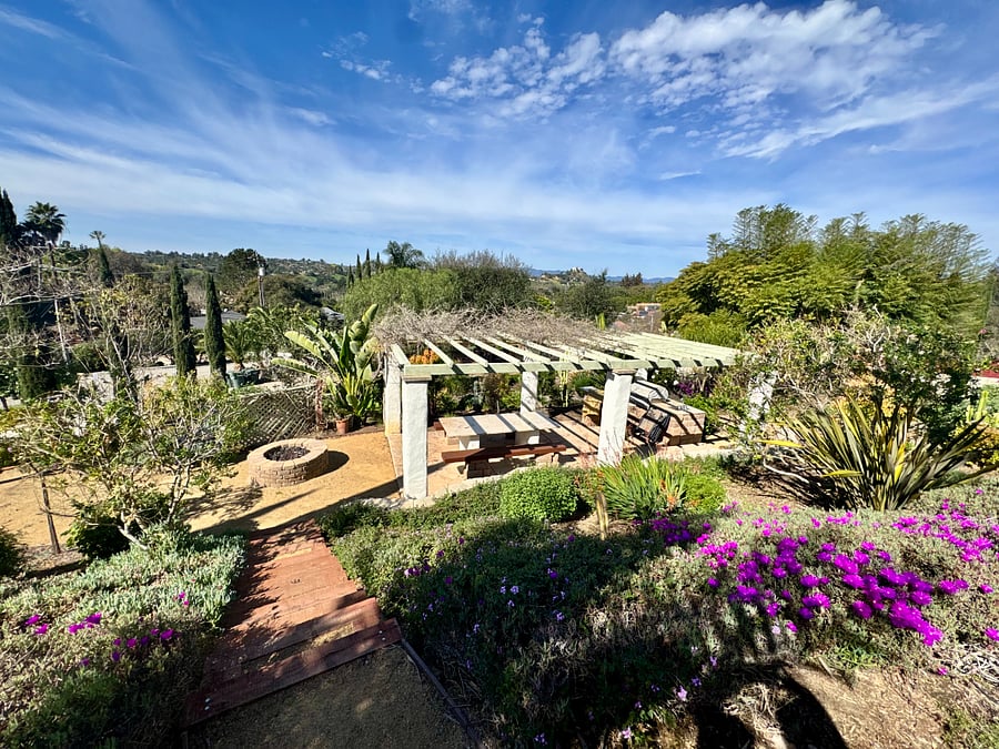 View of pergola and property from the house