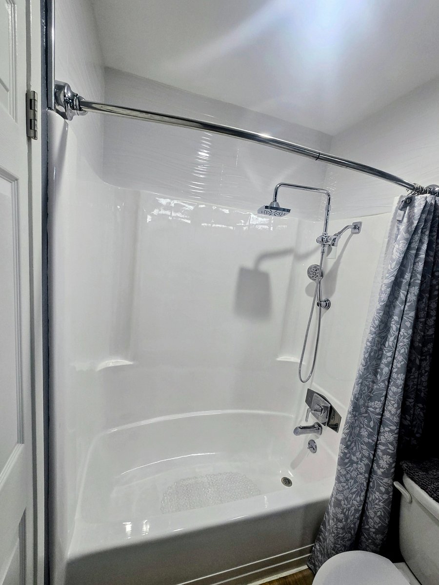 Shower Has A Water Filter and Adjustable Height Shower Head!