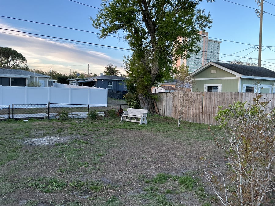 Right side shadow box fence with chain link back side 
