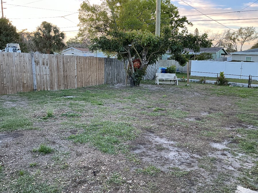 Inside looking out 
Left side shadow box fence and chain link fence back side Utility drive currently vacant home back side for sale with white privacy fence

