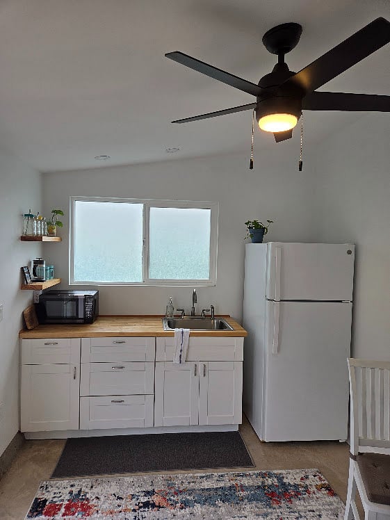 kitchenette - complete with 2 burner cook top, rice cooker, toaster oven, electric kettle  